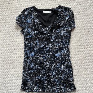Ricki’s short sleeve shirt, size XS.